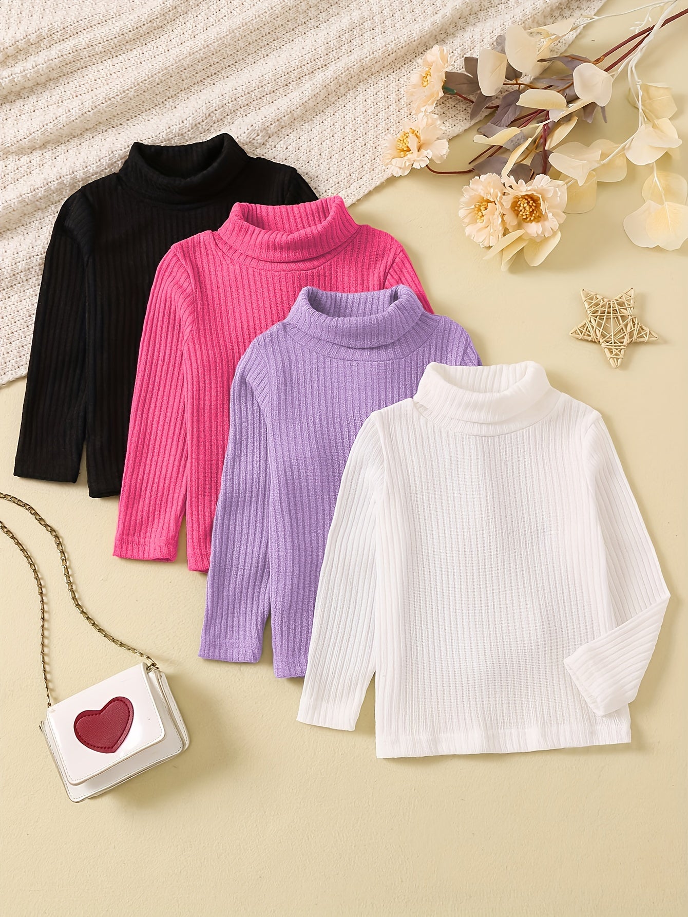 Ensemble de quatre pulls à col roulé