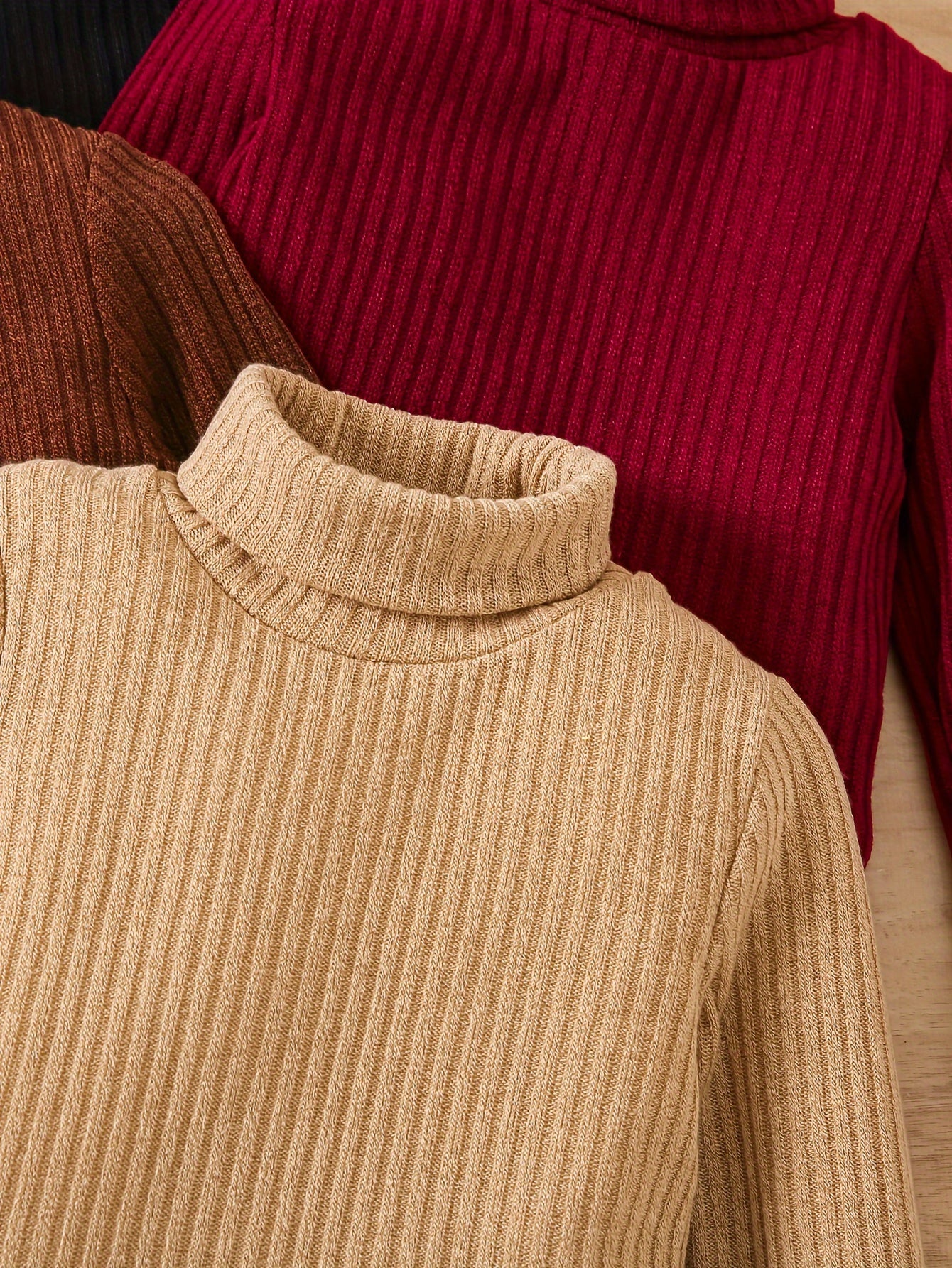 Ensemble de quatre pulls à col roulé